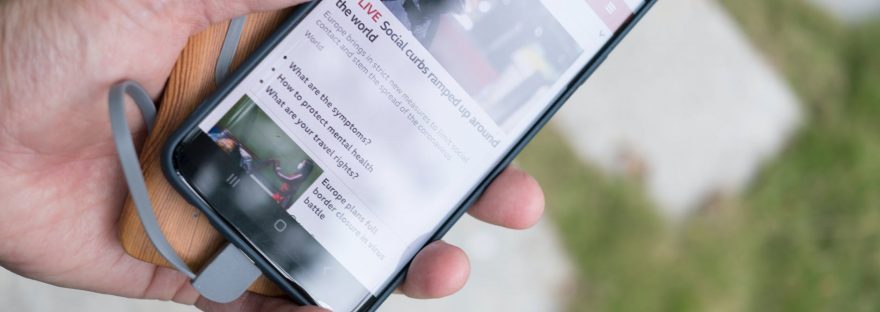 person holding black samsung android smartphone